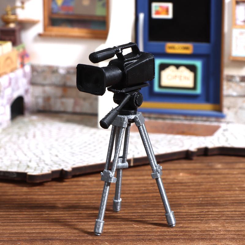 Mini Video Camera Tripod Model - огляд і ціна Photography Exhibition